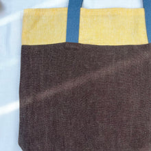 Load image into Gallery viewer, Tote bag. 100% linen tote bag. Stonewashed yellow and brown linen. Lined with an ex designer linen fabric.
