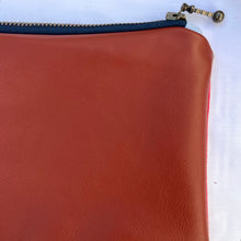 Load image into Gallery viewer, Red and white striped denim fabric and ginger brown leather Pouch with zip. Zippered purse. Zippered pouch. Cotton and leather. YKK zipper.

