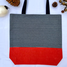 Load image into Gallery viewer, One of a kind bag. Tote Bag. Navy blue and white stripe cotton denim with an organic orange cotton denim bottom.
