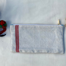 Load image into Gallery viewer, Red striped linen fabric and indigo blue denim fabric pouch. 2-fabric pouch. Zippered purse. Zippered pouch. YKK metal zipper.

