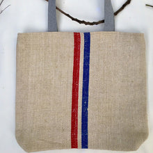 Load image into Gallery viewer, Vintage grain sack tote bag. Vertical blue and red stripes. Handwoven and hand-loomed. 100% hemp.

