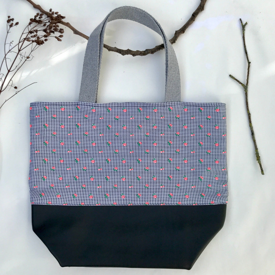 Handbag. Bag. Ex designer woven jacquard fabric tote with a soft black leather bottom.