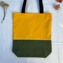 Load image into Gallery viewer, Tote bag. Canary yellow and khaki green cotton canvas tote bag. Lined with a green gingham pattern cotton fabric.
