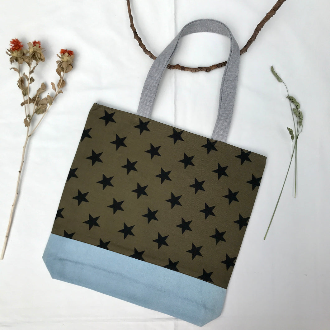 Tote bag. Khaki green twill cotton canvas with big black stars, fabric by a famous Italian designer house. Light blue cotton denim bottom.