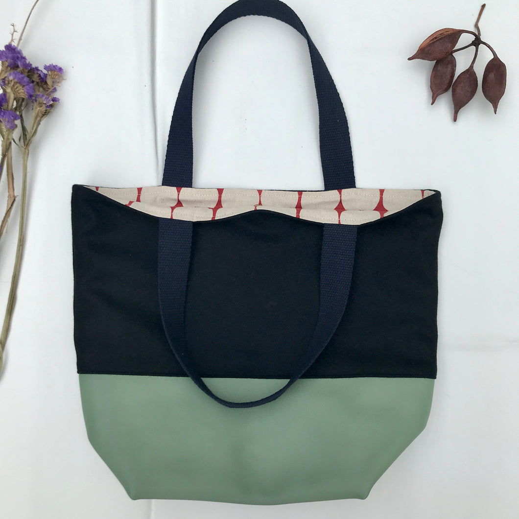 Handbag. Bag. Ex designer navy blue wool fabric and light mint green leather bag.