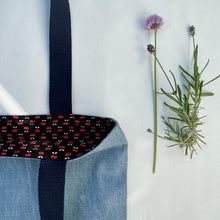 Load image into Gallery viewer, Tote bag. Light blue denim and green cotton canvas tote bag. Lined with a cherries pattern cotton fabric.

