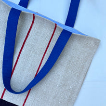 Load image into Gallery viewer, Tote bag. Vintage grain sack tote bag. Handwoven. Vertical red stripes (linen). Dark blue denim.
