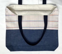 Load image into Gallery viewer, Tote bag. Vintage Hmong hemp fabric from Thailand with neon pink and blue denim stripes and a blue denim bottom.
