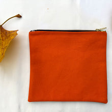 Load image into Gallery viewer, Orange cotton canvas and light blue denim pouch. 2-fabric pouch with YKK zip. Zippered purse. Zippered pouch.
