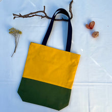 Load image into Gallery viewer, Tote bag. Canary yellow and khaki green cotton canvas tote bag. Lined with a green gingham pattern cotton fabric.
