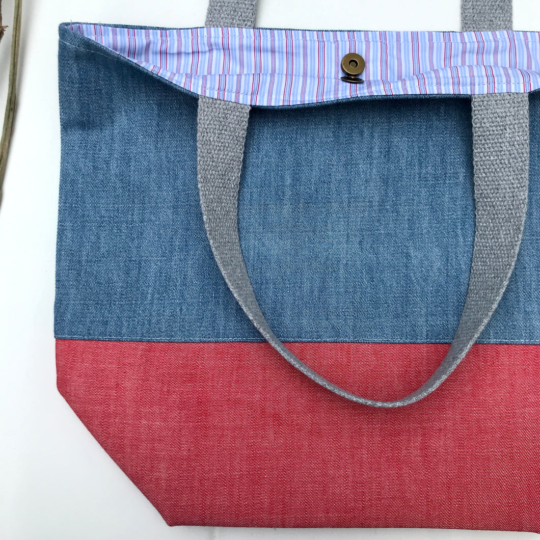 Handbag. Light blue denim and red denim handbag.