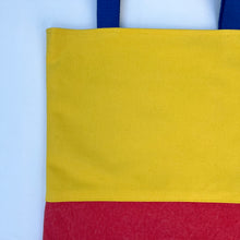 Load image into Gallery viewer, Tote bag. Vibrant yellow and red cotton canvas tote bag. Lined with a royal blue pattern cotton fabric.
