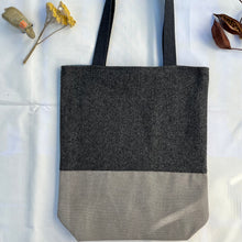 Load image into Gallery viewer, Tote bag. Grey Herringbone pattern wool with a grey washed cotton canvas bottom.
