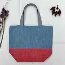 Load image into Gallery viewer, Handbag. Light blue denim and red denim handbag.
