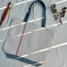 Load image into Gallery viewer, Tote Bag. Vintage French linen fabric with a light blue denim bottom.
