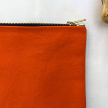 Load image into Gallery viewer, Orange cotton canvas and light blue denim pouch. 2-fabric pouch with YKK zip. Zippered purse. Zippered pouch.

