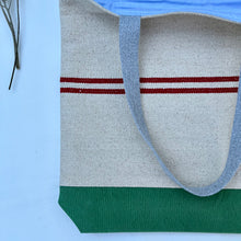 Load image into Gallery viewer, Tote bag. Heavyweight natural woven canvas with two horizontal dark red stripes. Green cotton canvas.
