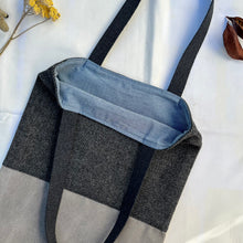 Load image into Gallery viewer, Tote bag. Grey Herringbone pattern wool with a grey washed cotton canvas bottom.
