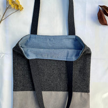 Load image into Gallery viewer, Tote bag. Grey Herringbone pattern wool with a grey washed cotton canvas bottom.
