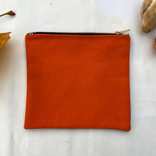 Load image into Gallery viewer, Orange cotton canvas and light blue denim pouch. 2-fabric pouch with YKK zip. Zippered purse. Zippered pouch.
