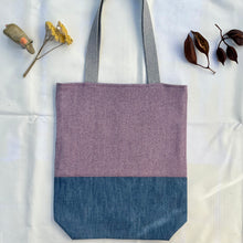 Load image into Gallery viewer, Tote bag. Pale mauve Herringbone pattern wool with a blue cotton denim bottom.

