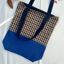 Load image into Gallery viewer, Tote bag. Ex designer check wool fabric tote bag with a royal blue cotton denim bottom.
