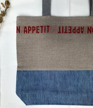 Load image into Gallery viewer, Tote Bag. 100% French linen fabric « Bon appétit » with a light blue denim bottom.
