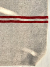 Load image into Gallery viewer, Tote bag. Heavyweight natural woven canvas with two horizontal red stripes. Lined with a beautiful striped cotton shirting fabric.
