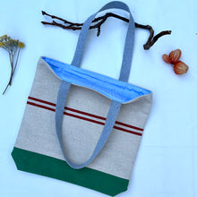 Load image into Gallery viewer, Tote bag. Heavyweight natural woven canvas with two horizontal dark red stripes. Green cotton canvas.
