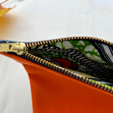 Load image into Gallery viewer, Orange cotton canvas and light blue denim pouch. 2-fabric pouch with YKK zip. Zippered purse. Zippered pouch.
