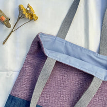 Load image into Gallery viewer, Tote bag. Pale mauve Herringbone pattern wool with a blue cotton denim bottom.
