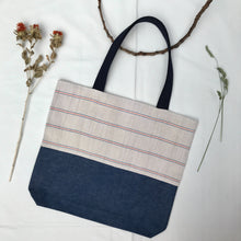 Load image into Gallery viewer, Tote bag. Vintage Hmong hemp fabric from Thailand with neon pink and blue denim stripes and a blue denim bottom.
