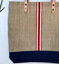 Load image into Gallery viewer, Tote bag. Vintage grain sack tote bag with brown leather straps. Handwoven. Vertical red and leather white stripes.
