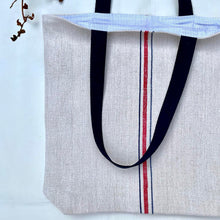 Load image into Gallery viewer, Tote bag. Vintage grain sack tote bag. Vertical deep blue and red stripes.
